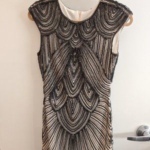 Beautiful beaded flapper dress with fringe bottom